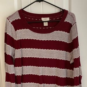 Maroon sweater with silver stripes